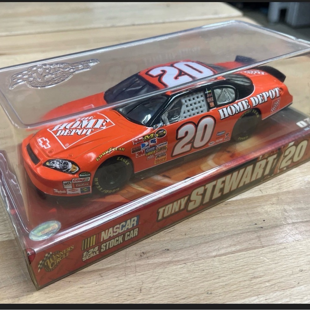 137–New Nascar Orange and Black Diecast Car